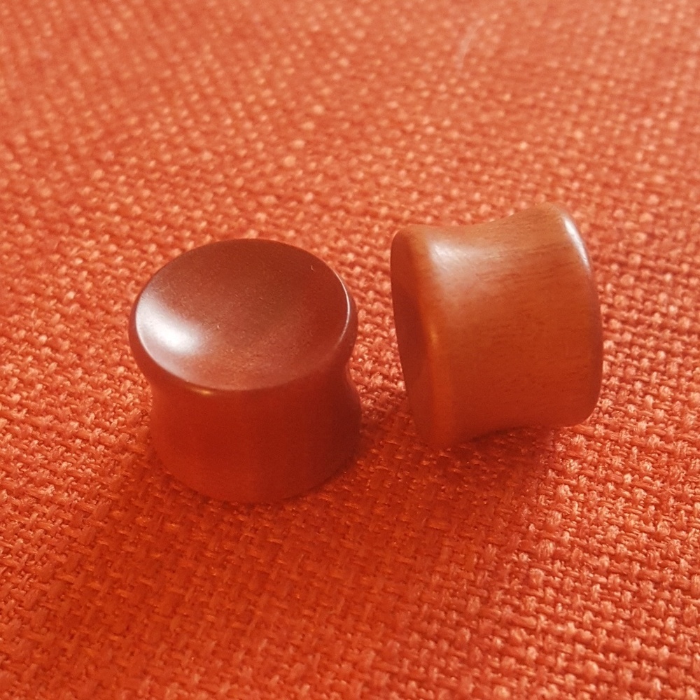 Pink ivory plugs, 9/16", NEVER WORN, double flare